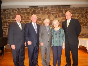 Rev. Thomas Maurer (left), Vice Chair, Cornwall Manor Board of Trustees; Curtis Walizer (second from left), Chair, Cornwall Manor Board of Trustees and Steven Hassinger (right), President, Cornwall Manor congratulate The Rev. Robert and Jean Stokes on receiving the 2016 Founders Day Award.