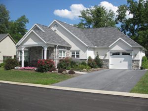 White house with garage at Cornwall Manor