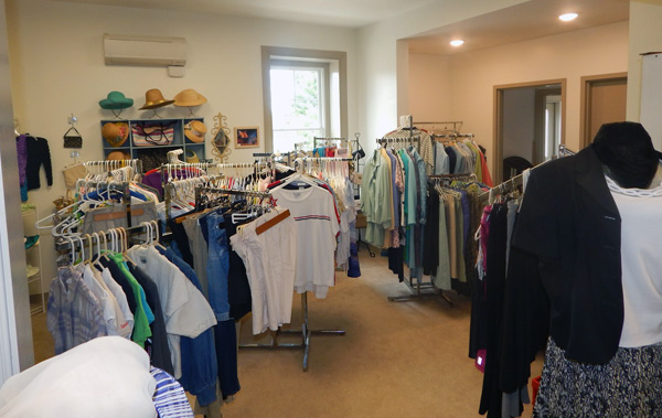 Racks of clothing inside of Treasure Trove Thrift Shoppe at Cornwall Manor Retirement Community 