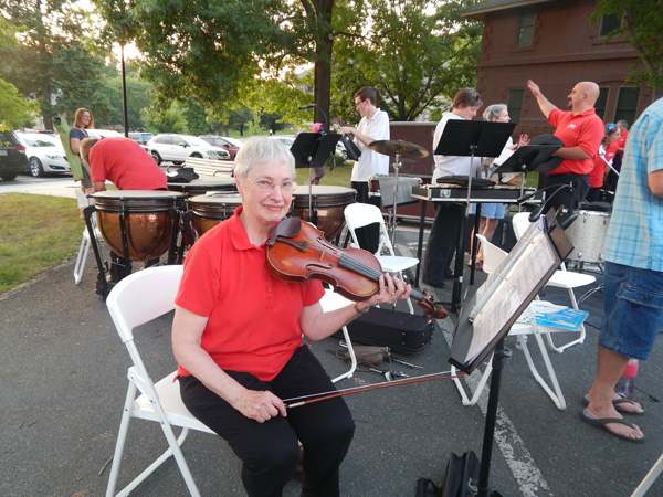 Helen Johnstone posing with her violin at the Hershey Symphony Orchestra 