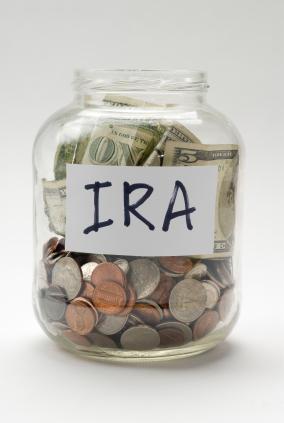 Jar filled with coins labeled IRA