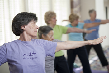 Residents taking a yoga class