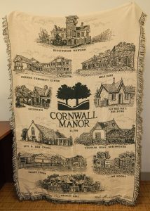 Blanket with Cornwall Manor logo and historic Cornwall Manor buildings embroidered 