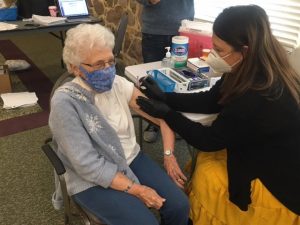 Cornwall Manor resident receiving COVID-19 Vaccine