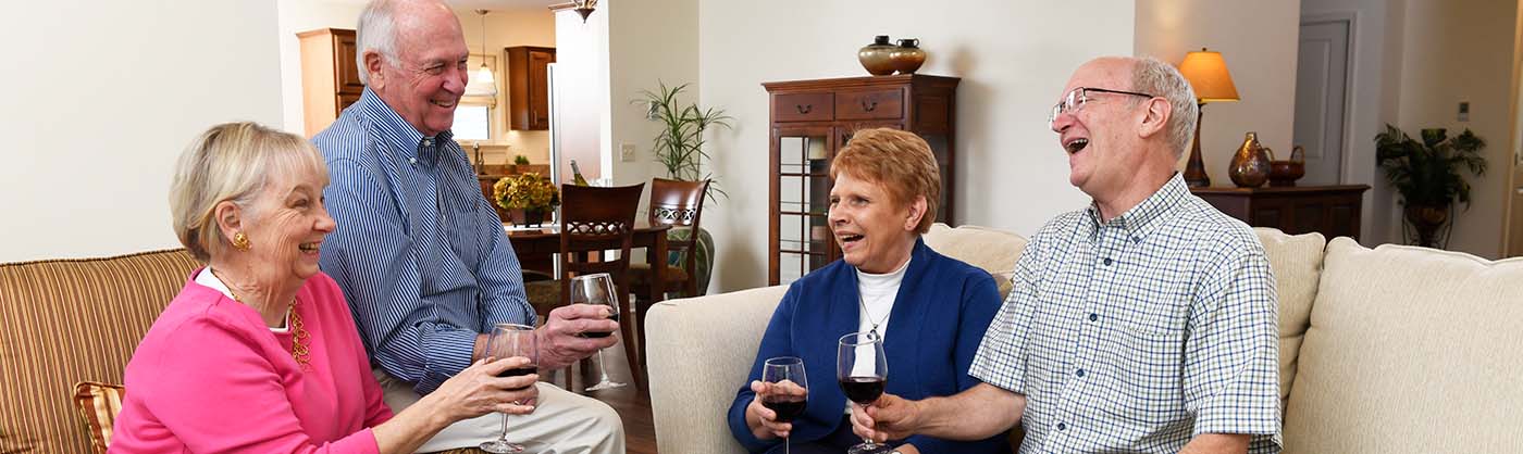 Residents enjoying a conversation and drinks
