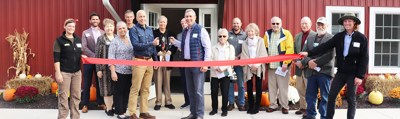 The ribbon cutting ceremony for the grand opening of the Trailside Organic Farm.